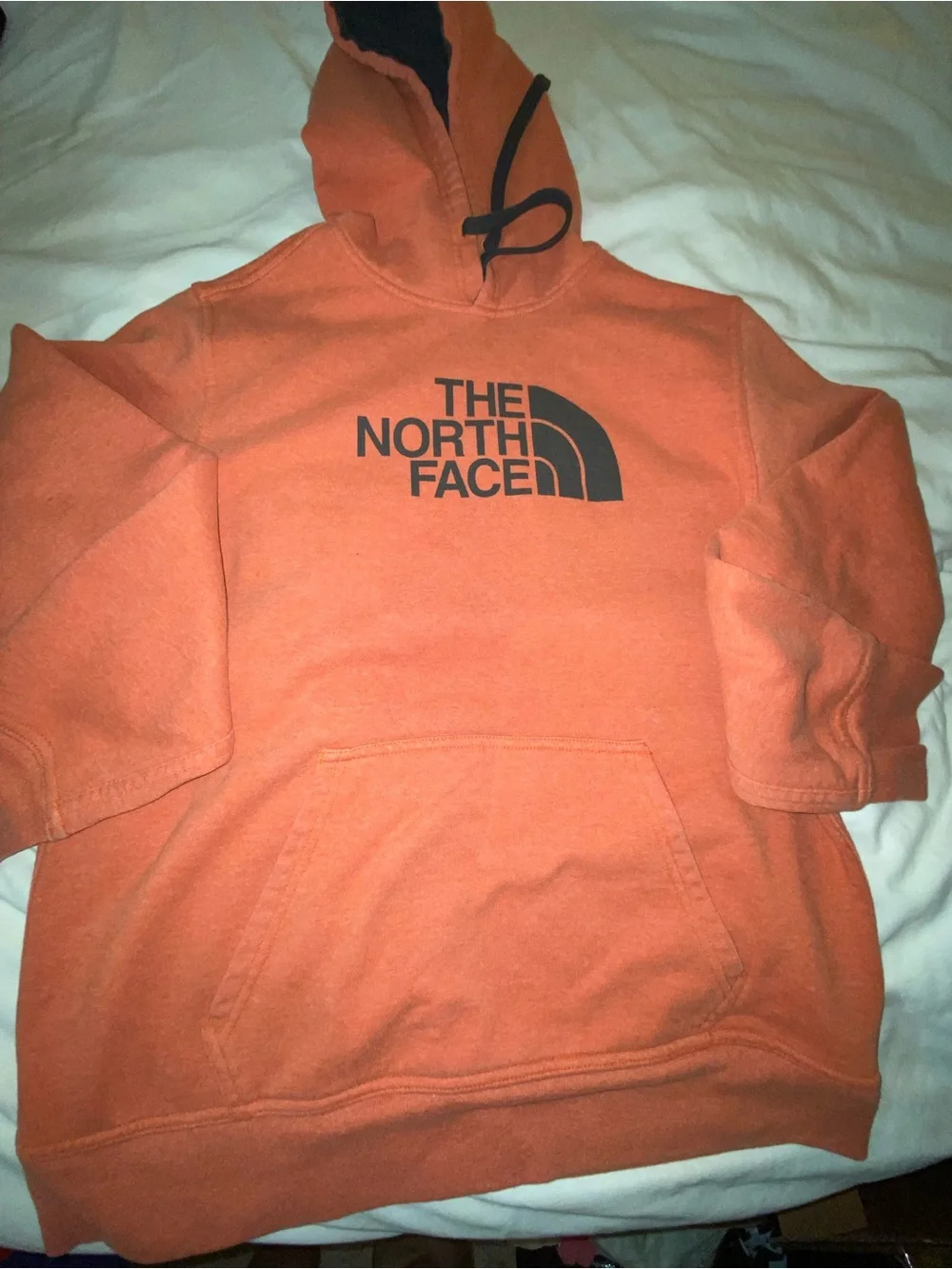 The North Face Orange Pullover Hoodie with Black Logo